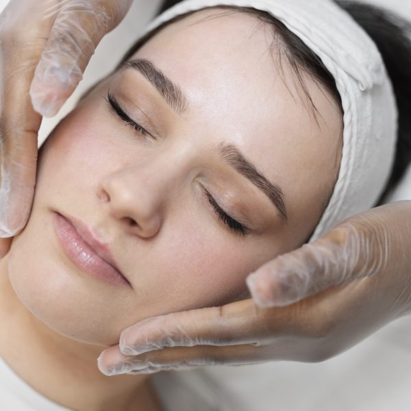 person-getting-micro-needling-beauty-treatment