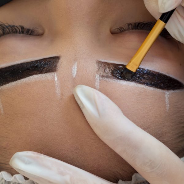 young-woman-going-through-microblading-procedure